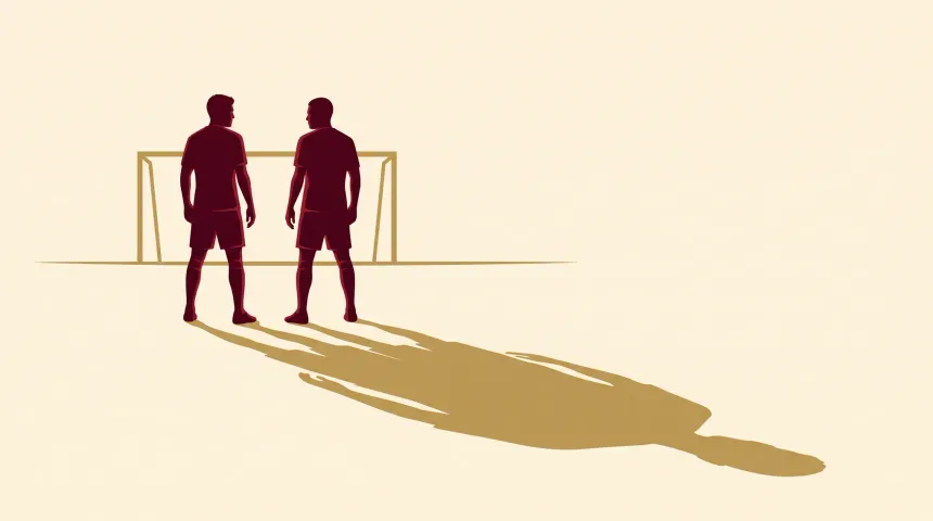 Dos futbolistas de equipos distintos se enfrentan, pero proyectan una única sombra compartida.